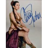 Star Wars Interest. Carrie Fisher. 8x10 inch colour in person signed portrait. Gold bikini.