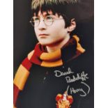 Movie Autograph. Harry Potter Interest. Daniel Radcliffe. Colour 8x10 inch In person signed scene