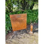 Arts and Crafts hand beaten copper fire guard, along with a similar fire tools stand. (2)