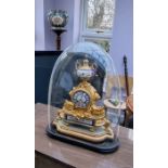 French (Sevres) ormolu gilt mantle clock with glass dome. Enamel face and decoration with lion