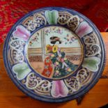 Large charger depicting an Oriental female. Hand decorated. Diameter 37cm