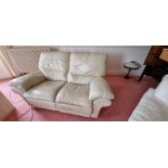 Cream leather 2 seater sofa. Excellent condition.