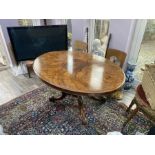 A tilt top table. Inlaid. Victorian.