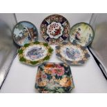 A hand painted plate along with a collection of Oriental theme decorative plates