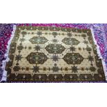 Modern rug in green/yellow/brown tones. 200 x 140cm as new.