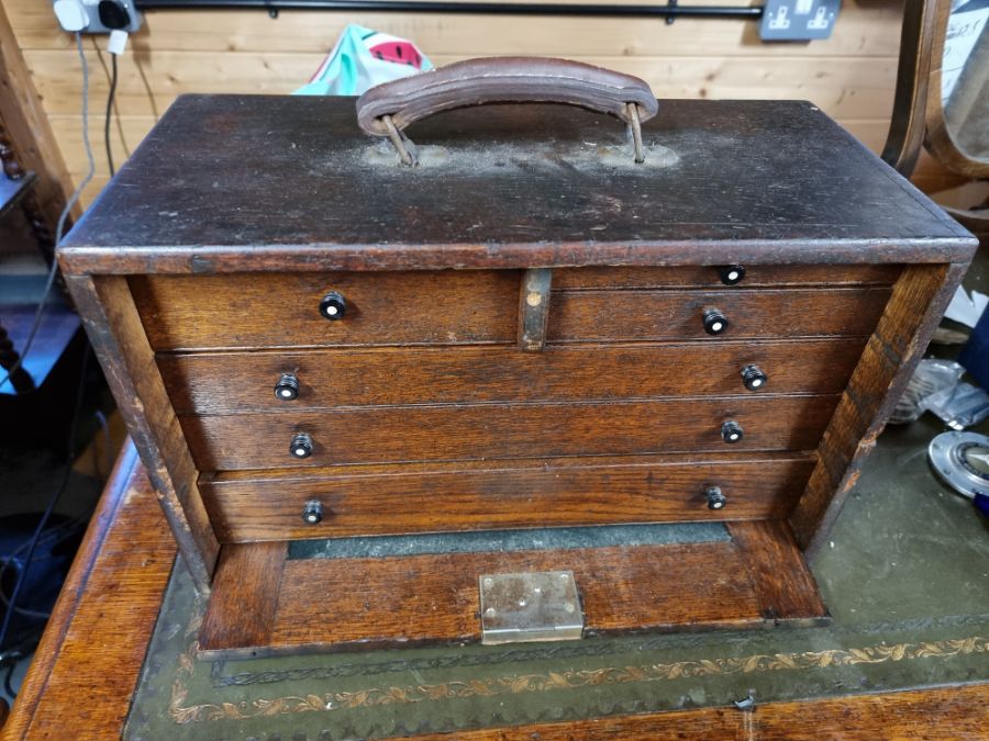 An engineers tool box comprising of drawers with a carrying handle. Filled will engineers