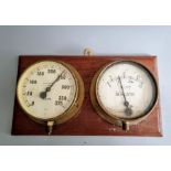 Mounted rail related gauges on a wooden plaque
