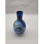 Art Studio glass vase in multi colours on a blue base. approx 10cm. No signs of damage or repair.