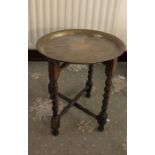 Brass top table on folding legs. H46cm W42cm Anglo Indian.
