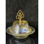 Etched glass lidded dish with a gilt handle.