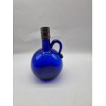 A Victorian or earlier, Bristol blue glass decanter with unmarked silver collar