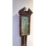 Stick barometer. Brass face housed in a carved frame. Signed. see images. Inscribed London