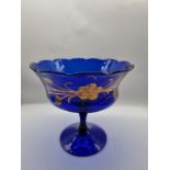 A Victorian centrepiece fruit bowl. Blue glass with gilt hand painted decoration and fluted rim.