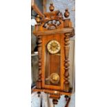 Vienna wall clock. carved including key and pendulum. Condition very good.