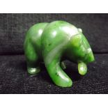 Chinese Spinach / Mottled Jade Hardstone Carving. Bear with a fish in its mouth. Weight - 0.198