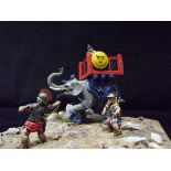 Roman War Elephant Miniature Diorama. Painted Metal Figures mounted onto wooden base. Some losses of