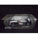 Hot Wheels Racing 1:18 Scale Formula One Car. McLaren MP4-17D 'Kimi Raikkonen' (B1650). Sponsors are