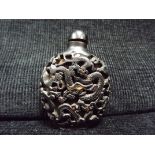 Chinese Eight Dragon Snuff Bottle. Unusual, made of light coloured possibly ceramic type material