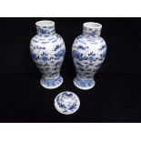 2 x Chinese Blue and White lidded Vases. Qing Dynasty - Kangxi 4 character mark but 20th century.
