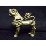 Chinese / Sino Tibetan - Gilt Bronze Qilin figure. Crude casting, generally good condition. 15cm