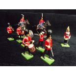 W. Britains - Coldstream Guards Marching Band. Household Cavalry Soldier is 'Britains' and dated