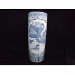 Large Chinese Stick / Umbrella Stand. 20th century Blue and White Ceramic. Decorated with a Lake