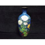 Large Japanese Cloisonne Enamel Flowers Vase. Decorated with various flowers on a blue ground. There