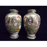 A Mirror Pair of Japanese Satsuma Vases. 20th century. Guan Yin with an Immortal. Enamel decoration.