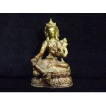 Nepalese/Tibetan - Gilt Copper Buddha Figure of Green Tara. 19th / 20th Century. Left hand holding a