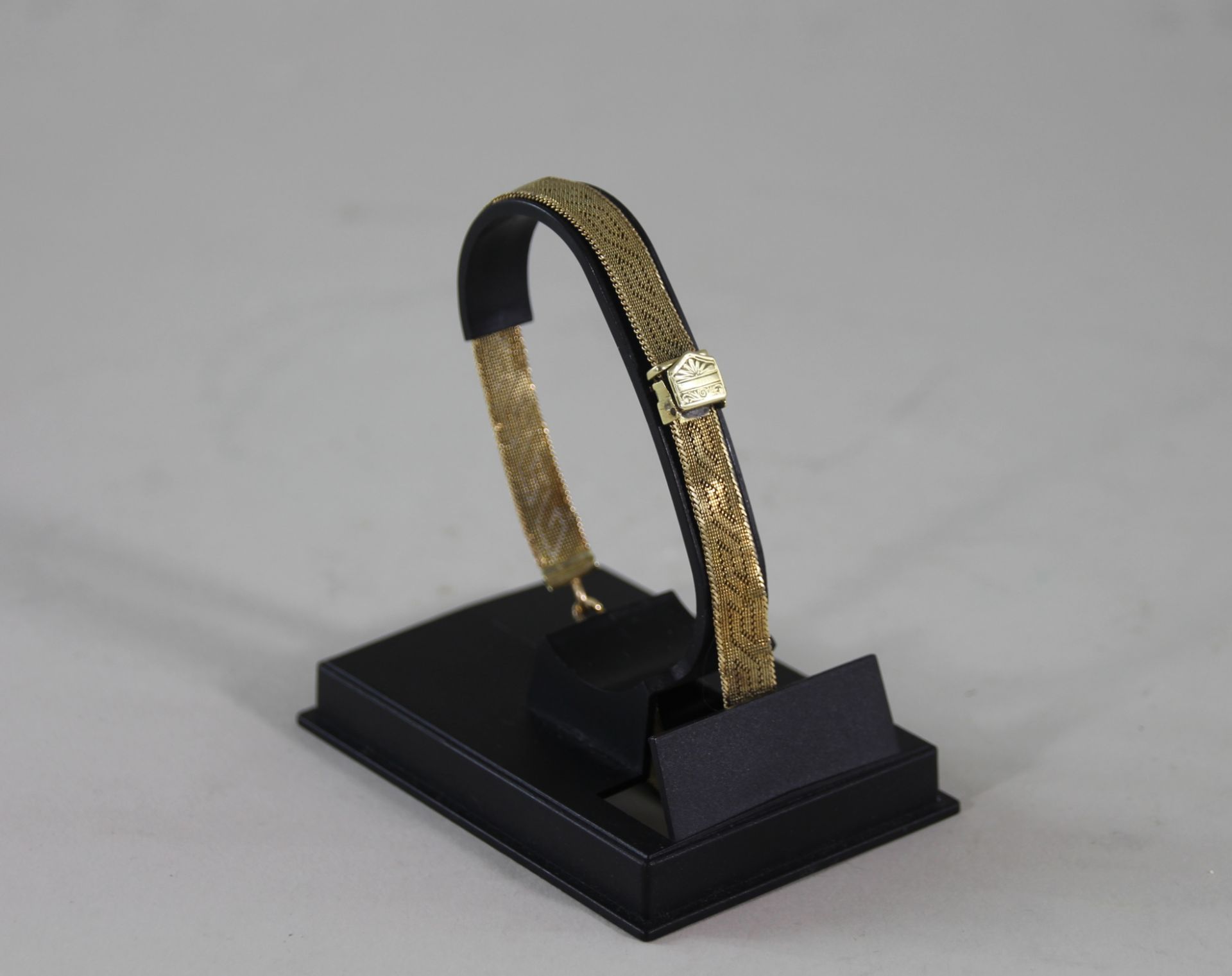 Milanese Armband, 585er Gelbgold, Ges.-Gew. ca.: 12,4gr. mit aufklappbaren Mittelteil, Länge ca.: