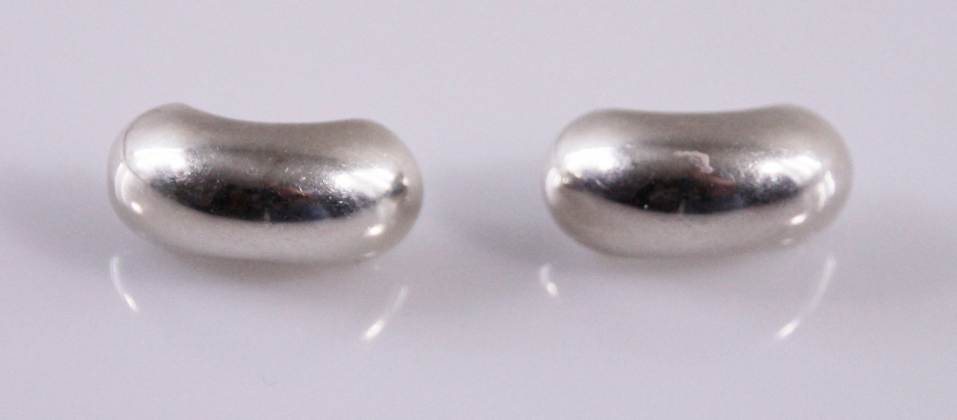 1 Paar Halb-Creolen, 925er Silber, Gesamtgewicht ca.: 3,9gr. Länge ca.: 2cm