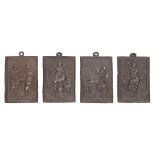 Lote de cuatro placas devocionales en plata patinada. España, s.XVIII-XIX.