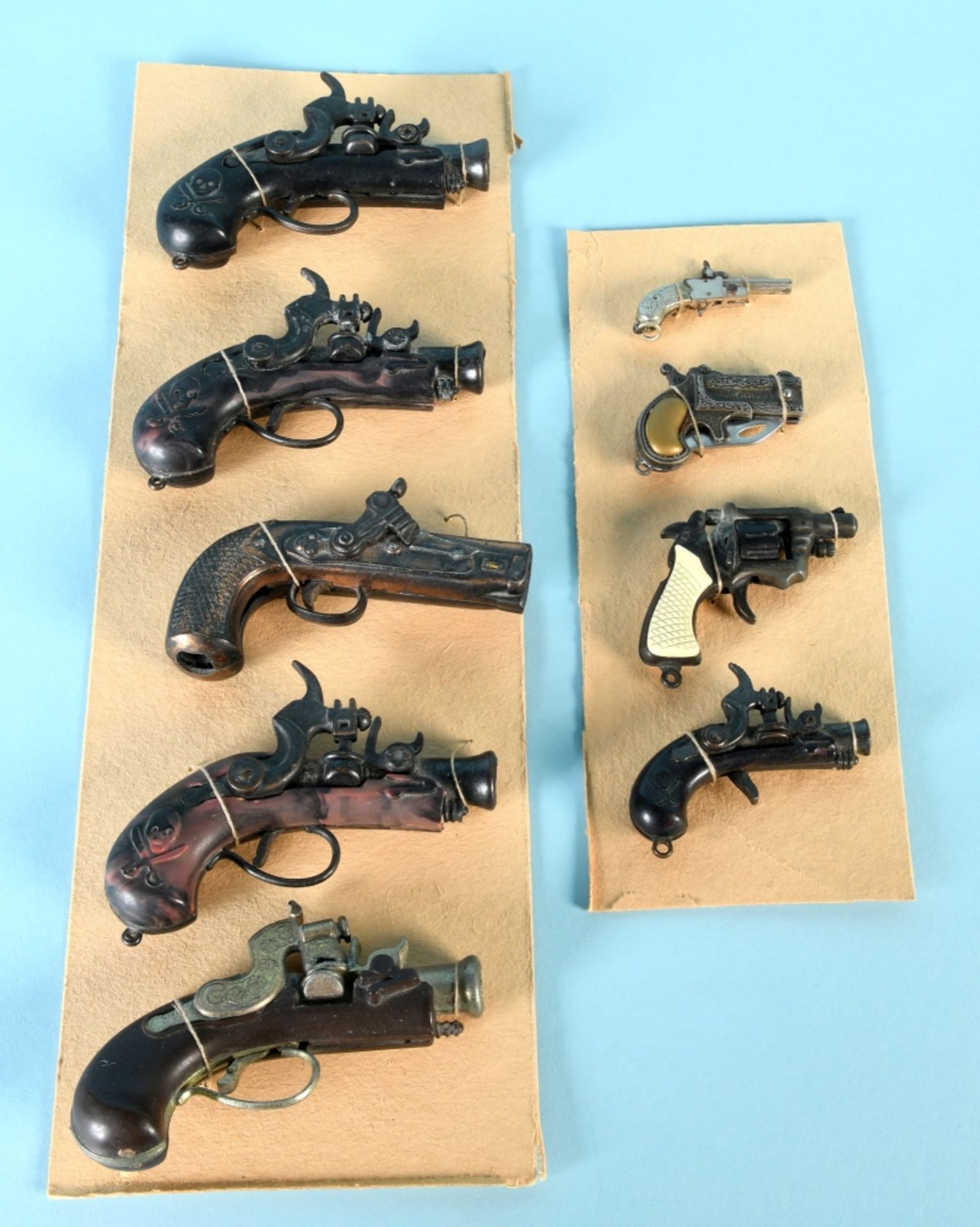 Miniaturpistolen, 9 Stück