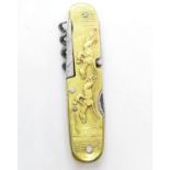 Multibladed French brass penknife with horse racing and sledging cover 3.5" long indistinct markings