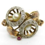 18ct gold modernist ring with ruby and pearl with diamond halo size P 3.7g