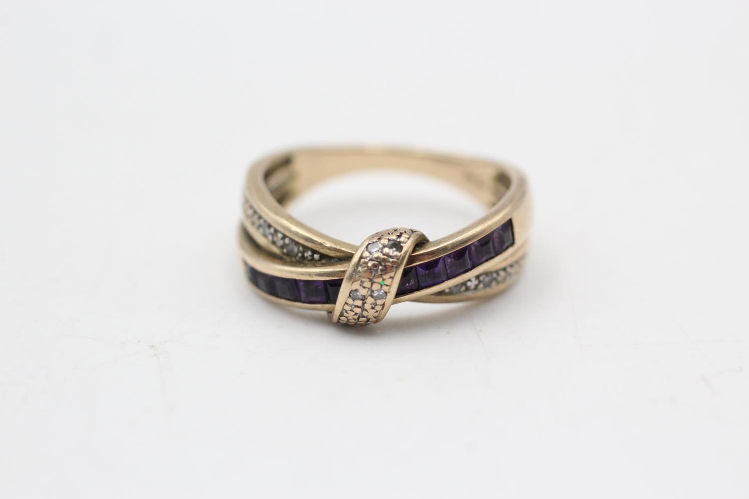 9ct gold & amethyst cross over ring (3g) Size M