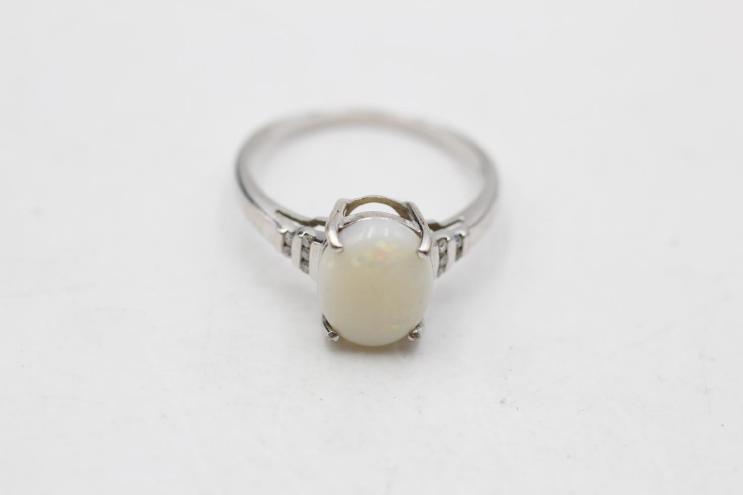 9ct white gold opal & diamond eleven stone dress ring (2.1g) Size O