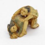 Carved coloured erotic Netsuke 80mm long