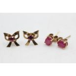 2 x 9ct gold ruby stud earrings inc. Glass filled (1.4g)