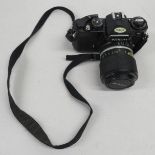 Nikon FE camera with lens
