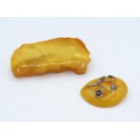 Pair of amber brooches butterscotch colour 34g