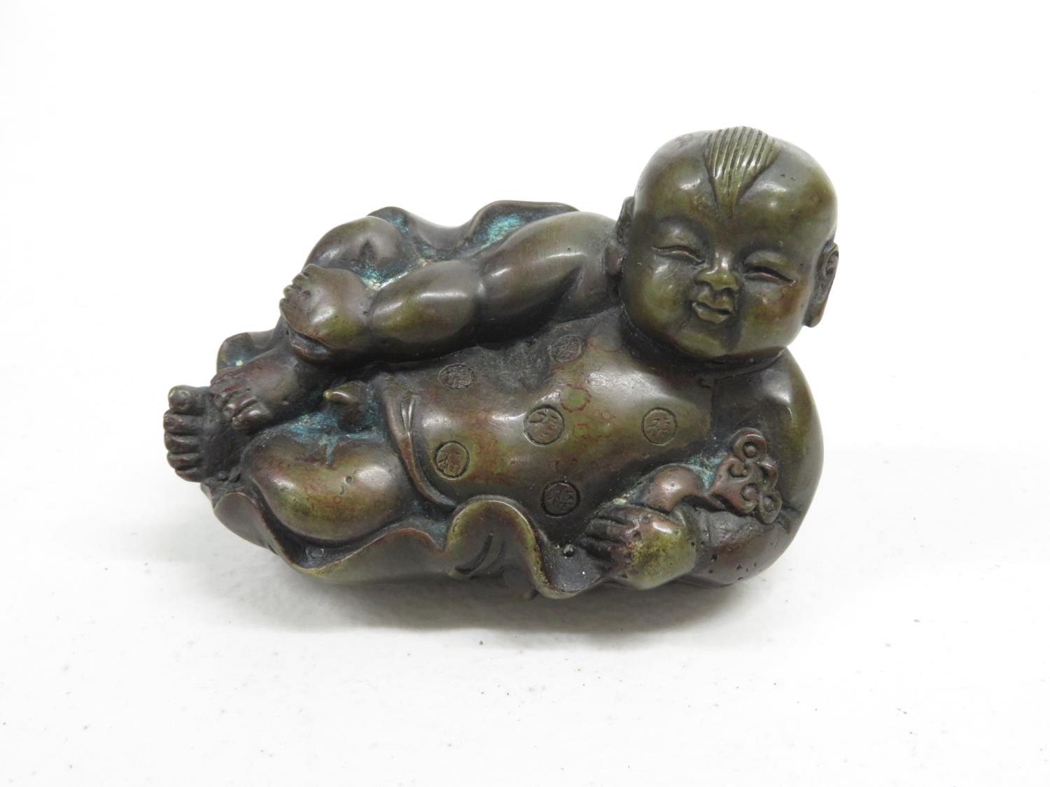 Cast bronze Buddha 4" long