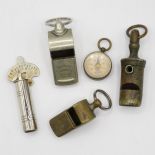 Selection of 4x whistles and 1x compass