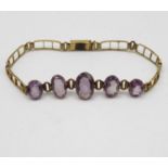 Antique gold bracelet with colour change sapphires tested for 9ct gold 7.8g