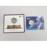 £50 coin and £100 coin pure silver in collector's packs of issue