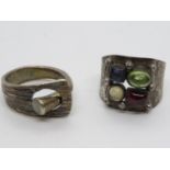 Two silver rings one with coloured stones sizes R and P 15.1g total; weight