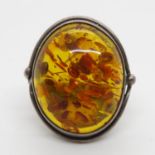 Silver ring with very large amber stone size R 11.6g