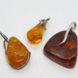 3x Amber and silver pendants 21.2g total weight