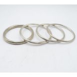 Collection of 4x silver bangles 78.5g