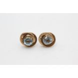 9ct gold blue topaz swirl stud earrings (1.2g)